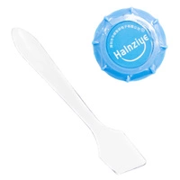 Słoik z pastą termoprzewodzącą i aplikator